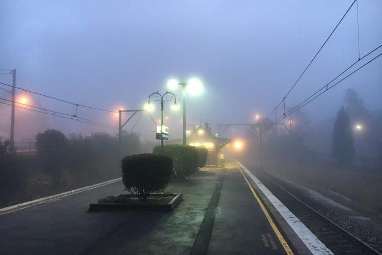 Image of Medlow Bath train station taken at dusk on a foggy morning